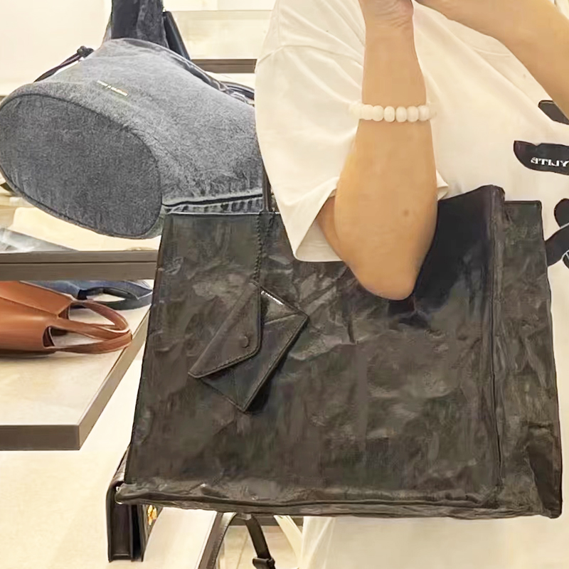 أكياس محفورة على ورق كرافت الك - مراجعة Luxury Bags Vendor وسعره