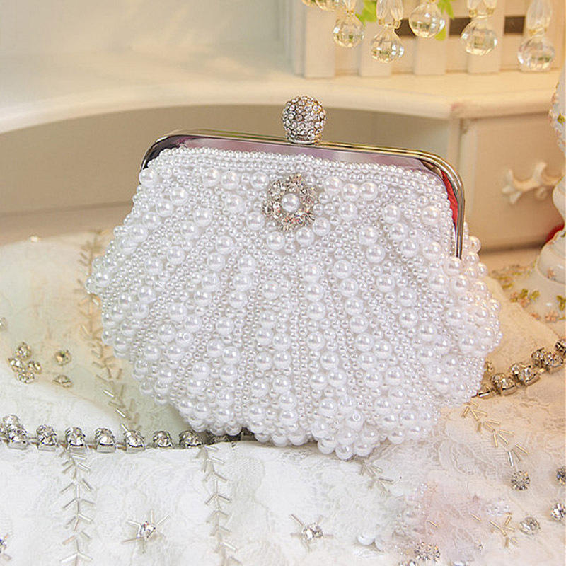 حقيبة يد فاخرة من اللؤلؤ صدفي  - مراجعة Luxury Bags Direct وسعره