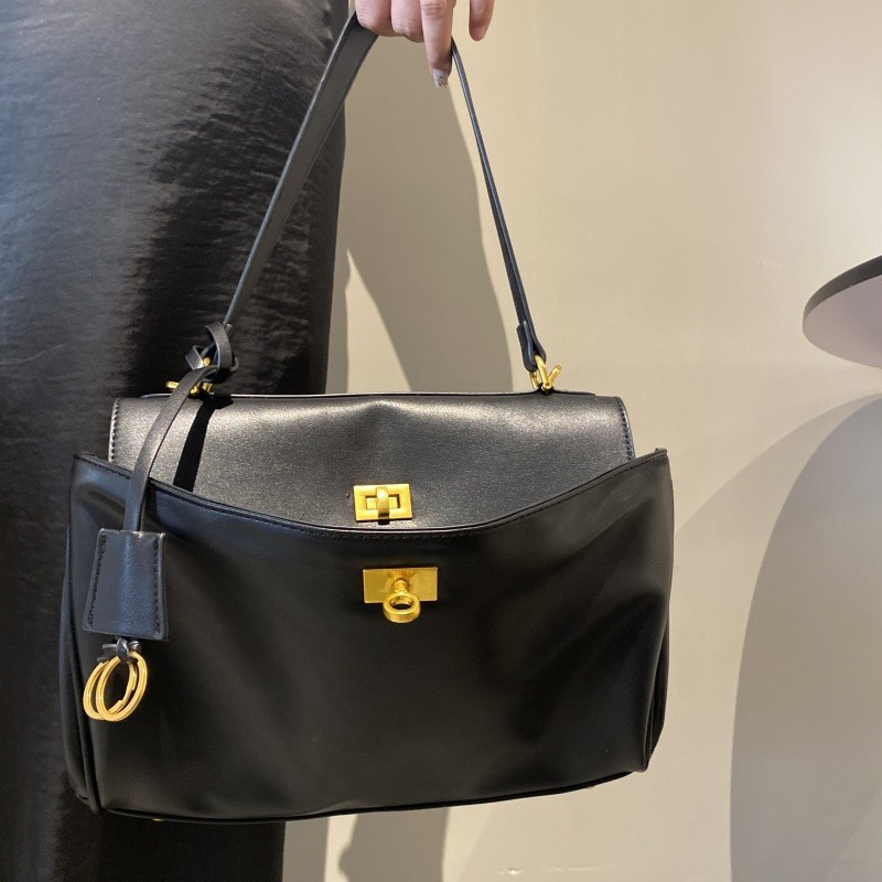 حقيبة يد نسائية كبيرة الحجم مص - مراجعة Luxury Bags Storage وسعره